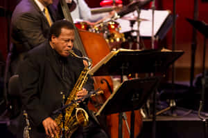 Legendary Jazz Musician Wayne Shorter Performing Live Wallpaper