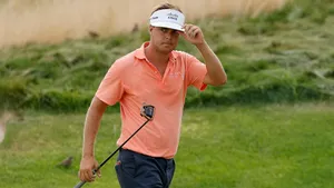 Legendary Keith Mitchell Posing With Background Of Greenery Wallpaper