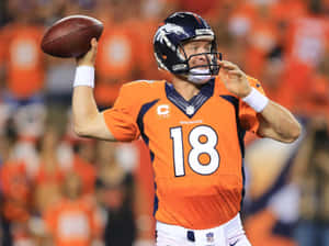 Legendary Peyton Manning In Action Wallpaper