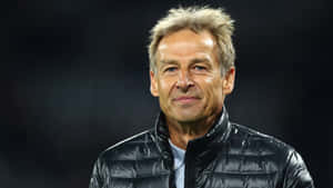 Legendary Soccer Player Jurgen Klinsmann In Action Wallpaper