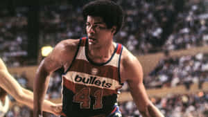 Legendary Washington Bullets Player Wes Unseld In Action Wallpaper