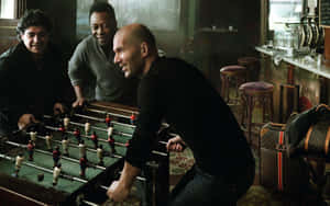 Legends Playing Foosball Wallpaper