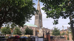 Leicester Church Spireand Trees Wallpaper