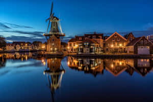 Leiden Windmill Reflectionat Twilight Wallpaper