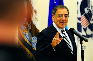 Leon Panetta Doing Hand Gesture Wallpaper