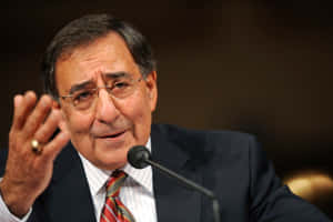 Leon Panetta Gesturing With Hand Wallpaper