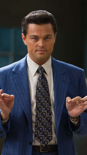 Leonardo Dicaprio Embracing His Iconic Role As Jordan Belfort In The Wolf Of Wall Street Wallpaper