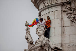 Lesbian Carrying Rainbow Flag Wallpaper