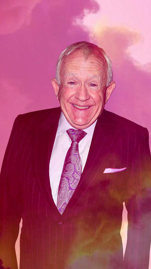 Leslie Jordan In Suit Smiling Wallpaper