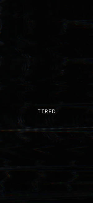 Lethargic Background With The Word Tired Wallpaper