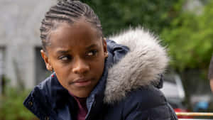 Letitia Wright Intense Gaze Outdoors Wallpaper