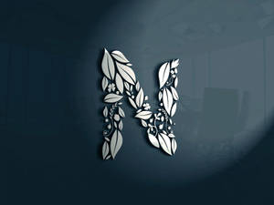 Letter N In White Leaf Pattern Wallpaper