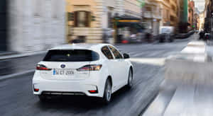 Lexus Ct 200h Hybrid Luxury Hatchback In Motion Wallpaper