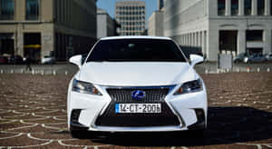 Lexus Ct 200h Hybrid Luxury Vehicle In Action Wallpaper