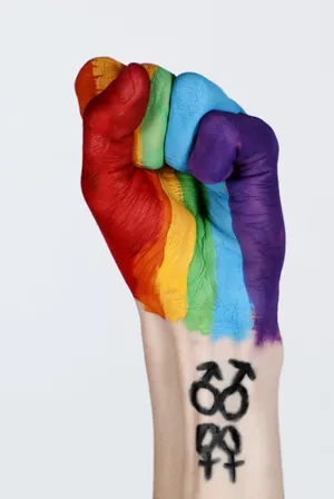 Lgbt Pride Fist With Rainbow Paint Iphone Wallpaper