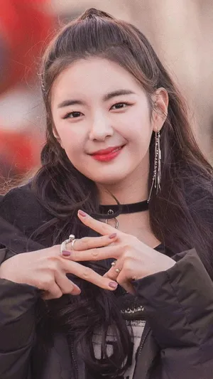 Lia Iconic Z Hand Sign Wallpaper