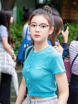 Lia Wearing Glasses Wallpaper