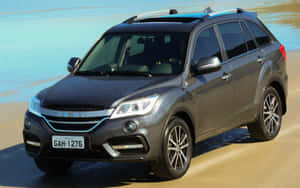 Lifan Motorcycle On Scenic Road Wallpaper