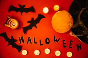 Light The Night With Halloween Candles Wallpaper