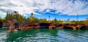 Lighthouse_ Above_ Cliffside_ Caves Wallpaper