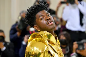 Lil Nas X Gold Armor Outfit Wallpaper