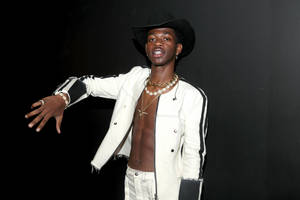 Lil Nas X White Cowboy Outfit Wallpaper