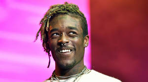 Lil Uzi Vert Radiates Captivating Charisma Wallpaper