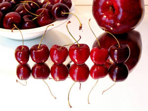 Line Of Different Cherries Wallpaper