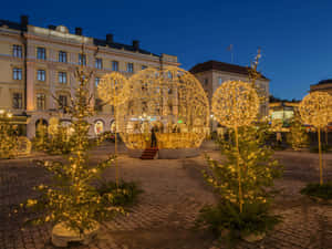 Linköping's Vibrant Cityscape At Sunset Wallpaper