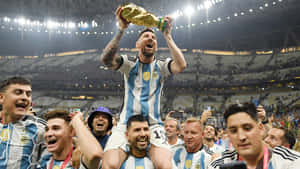 Lionel Messi Celebrating World Cup Victory Wallpaper