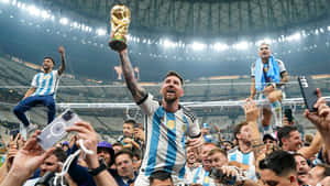 Lionel Messi Celebrating World Cup Victory Wallpaper