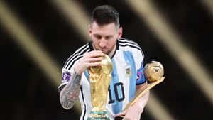 Lionel Messi Kissing World Cup Trophy Wallpaper