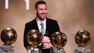 Lionel Messi With Four Ballond Or Trophies4 K Wallpaper