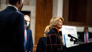 Lisa Murkowski Surrounded By People Wallpaper