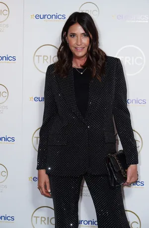 Lisa Snowdon At Event In Sparkling Suit Wallpaper