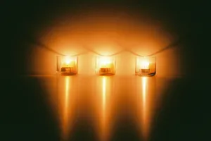 Lit Candles For Remembrance Day Wallpaper