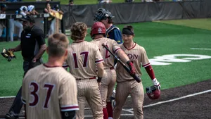 Little League Baseball Team In Action During A Game Wallpaper