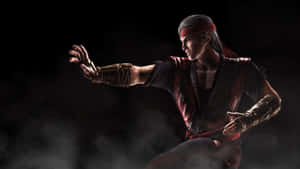 Liu Kang Unleashing His Fury In Mortal Kombat Wallpaper