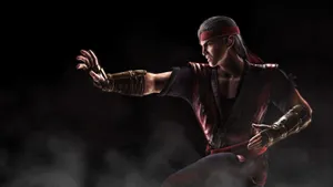 Liu Kang Unleashing His Fury In Mortal Kombat Wallpaper
