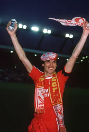 Liverpool Legend Alan Hansen Celebrating A Win Wallpaper