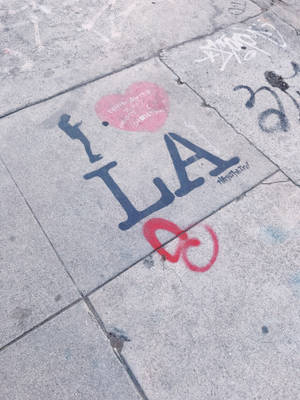 Lo Fi La Graffiti On Pavement Wallpaper