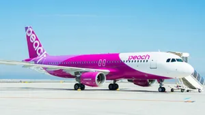 Loading Peach Aviation Plane Wallpaper