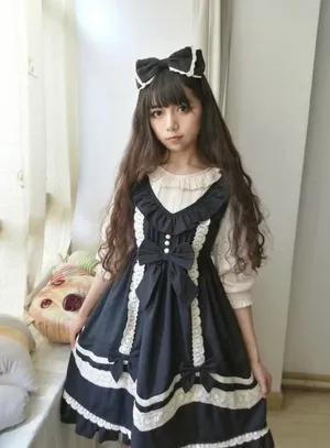 Lolita Fashion Style With Vintage Elegance Wallpaper