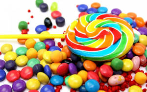 Lollipop And Nips Candies Wallpaper