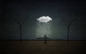 Lone Man Under A Rain Cloud Using His Phone Wallpaper