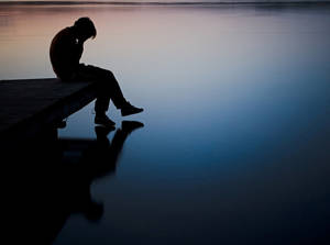 Lonely Man Alone On Dock Wallpaper