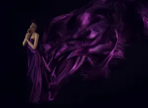Look Radiant In A Stunning Purple Dress Wallpaper
