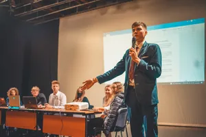 Look Sharp In A Navy Blue Suit Wallpaper