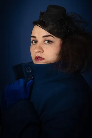 Look Stylish And Professional In This Navy Blue Coat. Wallpaper