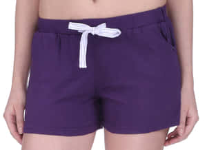 Look Your Best In Our Selection Of Trendy Purple Shorts! Wallpaper